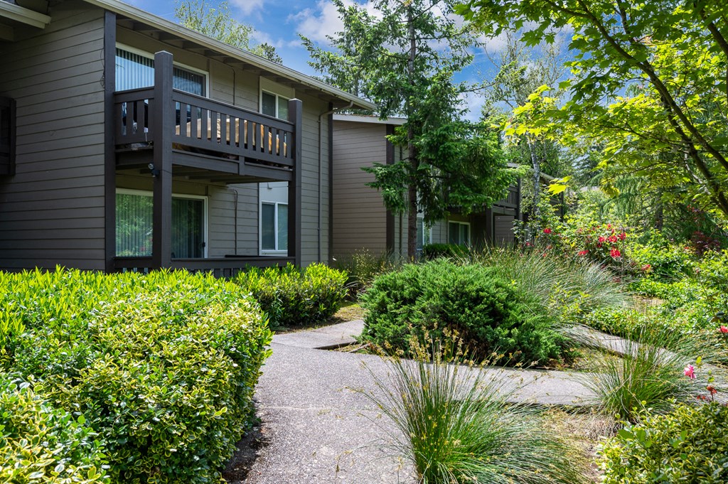 a walkway in front of a house
