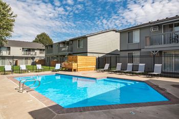 our apartments have a resort style pool with lounge chairs