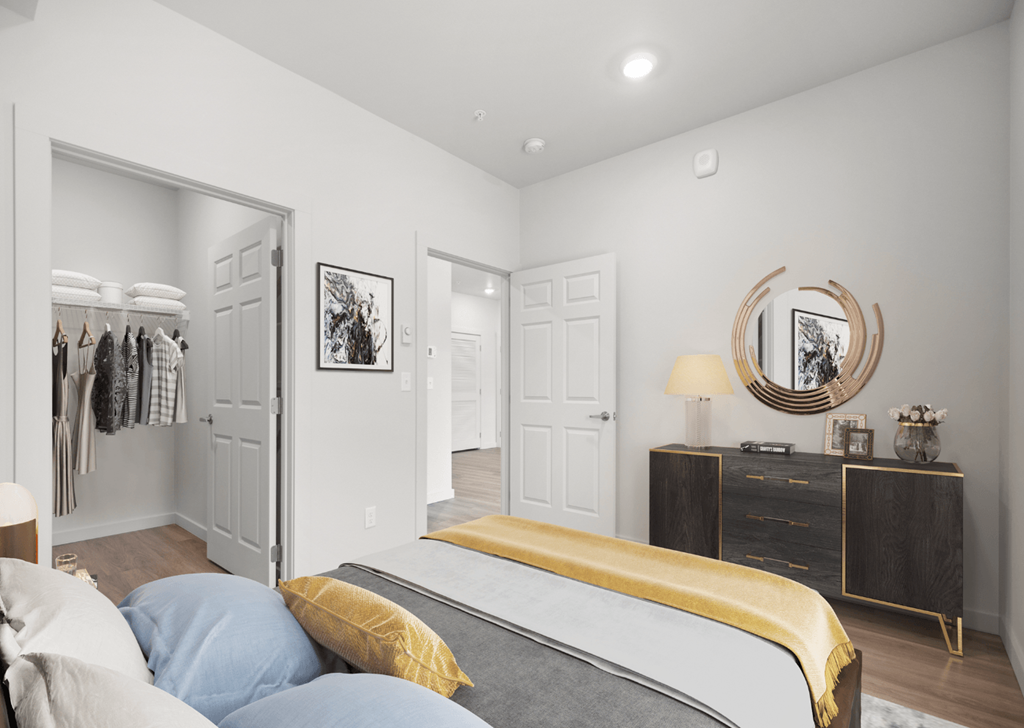 a bedroom with a bed and a closet