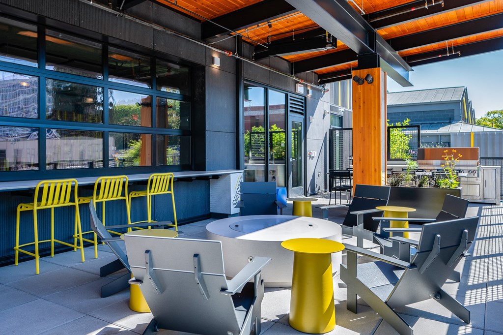 outdoor patio area with tables and chairs