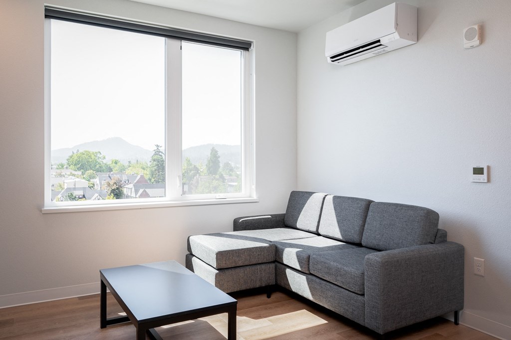 a living room with a couch and a coffee table