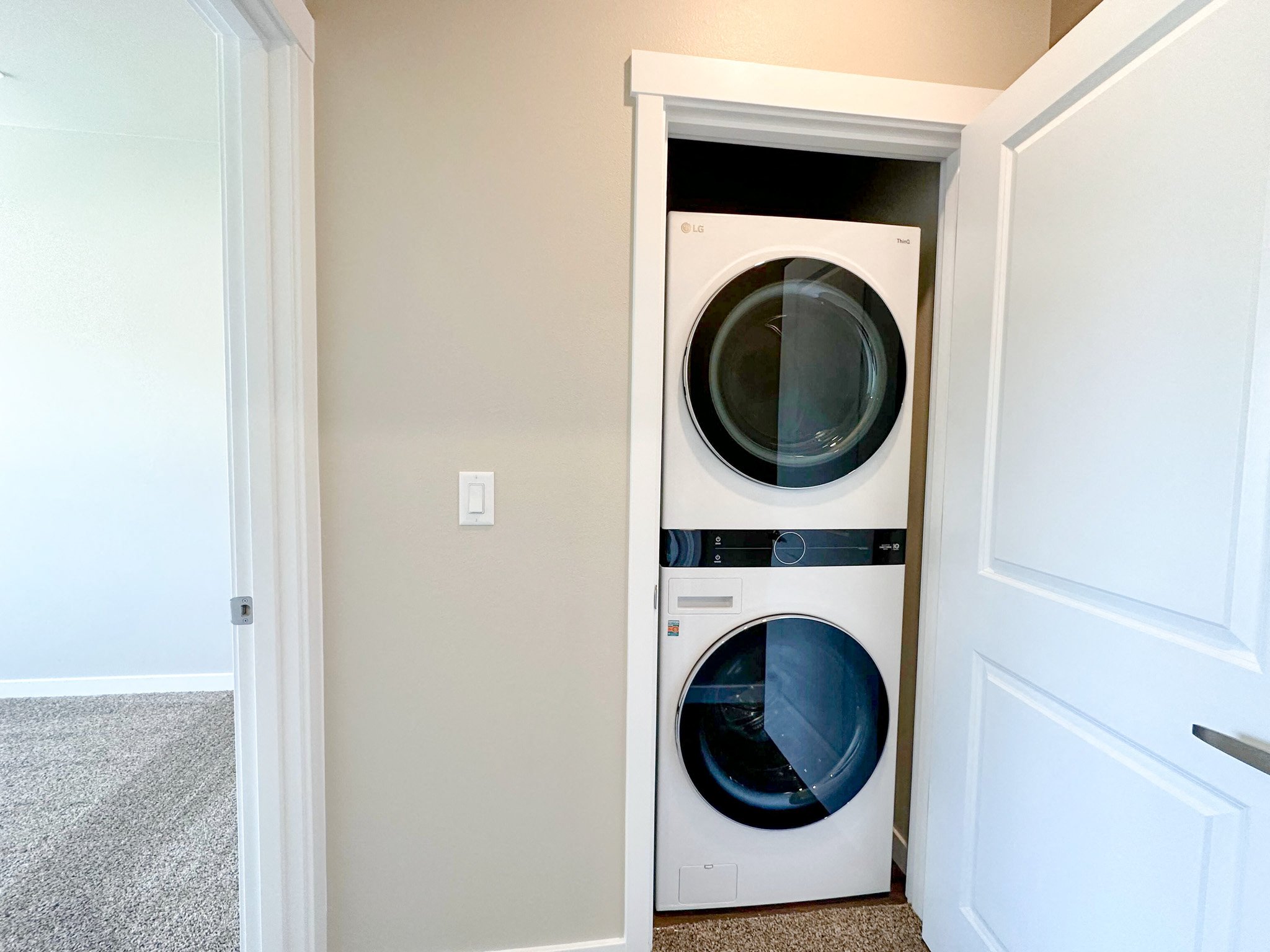a washer and dryer in a closet in a home