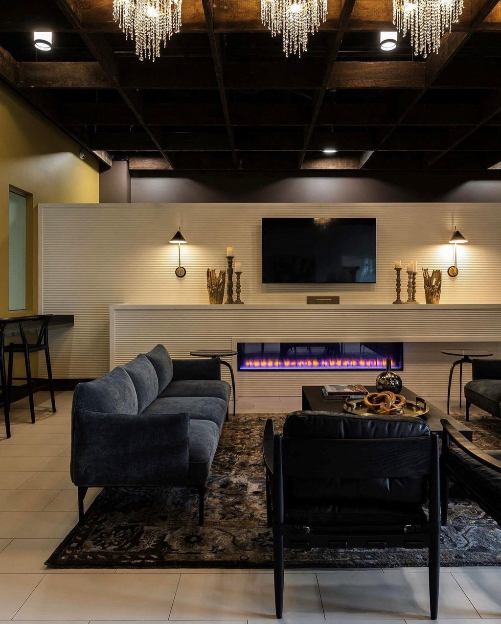 a living room with a couch and a tv