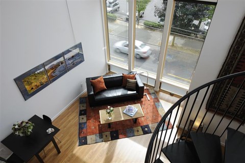 a living room with a couch and a table