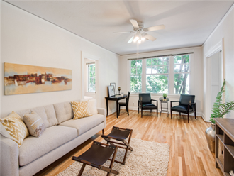 The Shannon | Living Room with Hardwood Floors and Large Windows