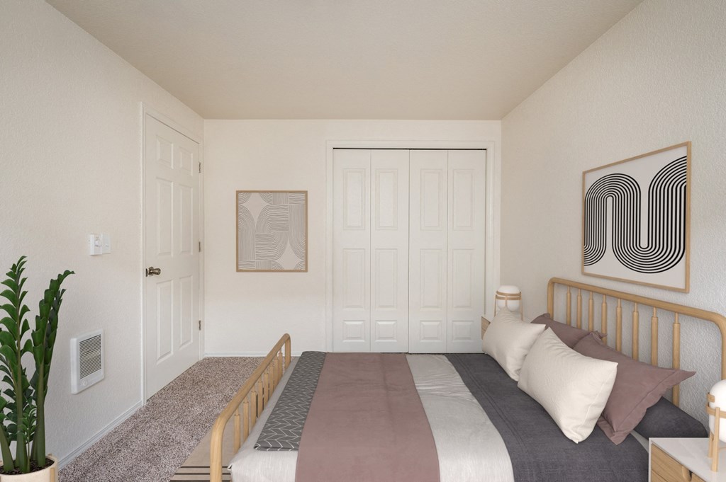 a bedroom with a bed and a white closet