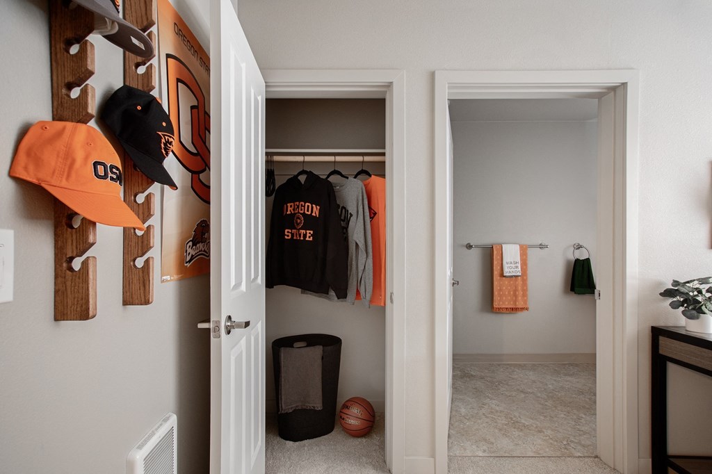 The Quad near OSU - Apartments in Corvallis, OR with wall to wall carpet, white walls, and access to the bathroom