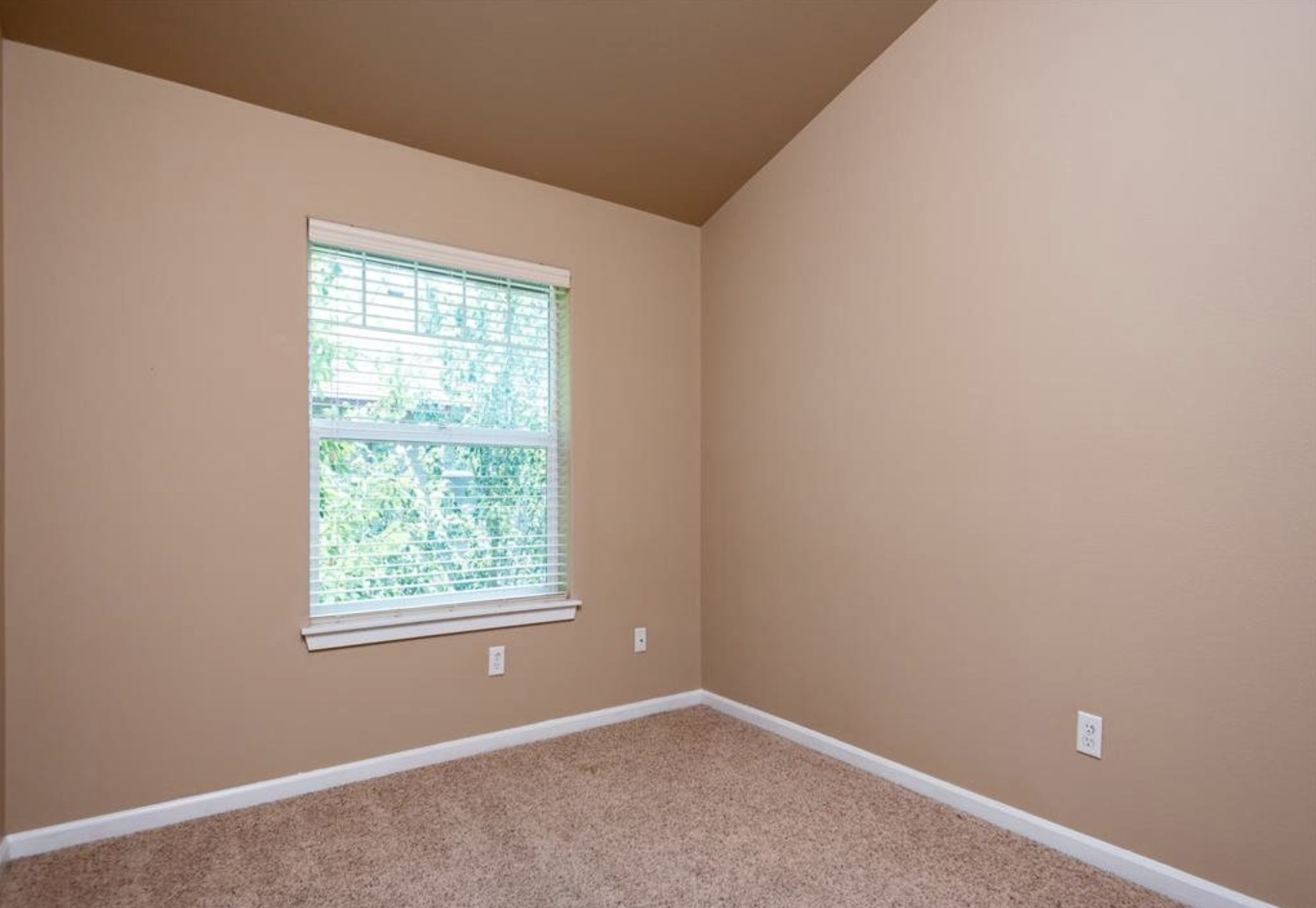 Southside Townhome | Bedroom with Wall to Wall Carpeting and  Window