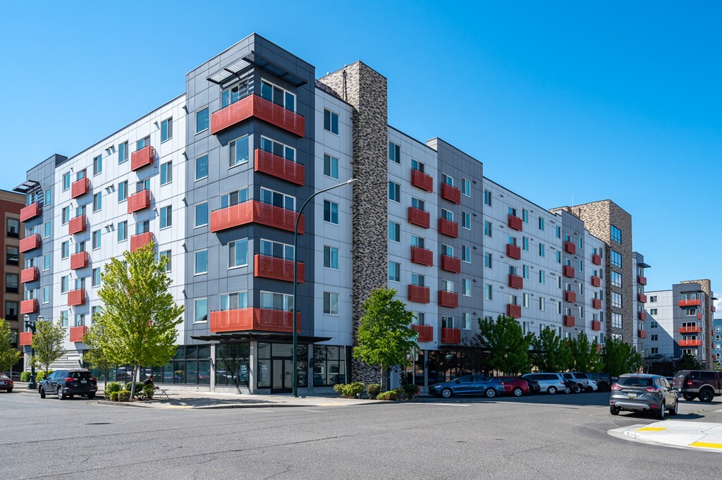 Apartments in Everett WA - The Waterline - Exterior View of The Apartment Building with Lush Landscaping