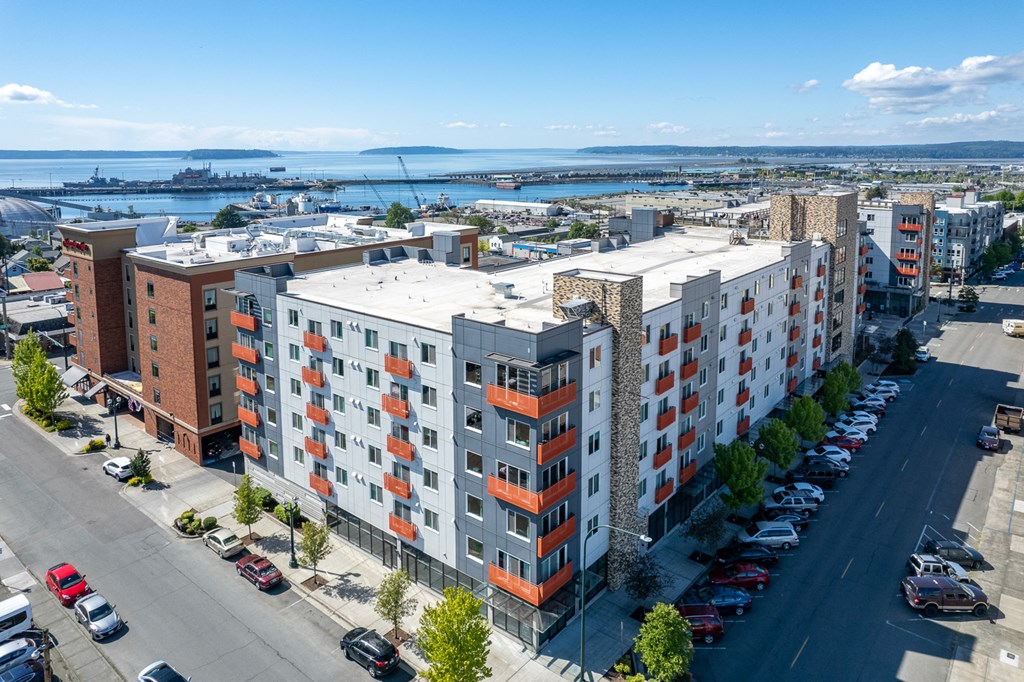 Apartments in Everett WA - The Waterline - Exterior View of The Apartment Building with Lush Landscaping