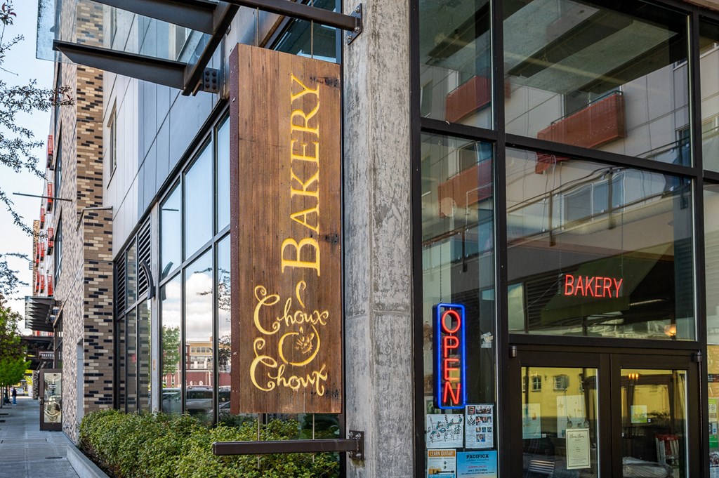 Apartments in Everett WA - The Waterline - Exterior View of The Apartment Building with Lush Landscaping