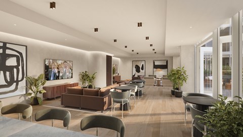 A modern living room with a large sofa and a coffee table.