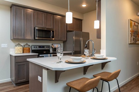 a kitchen with a sink and a counter top