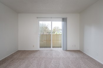 Roberts Landing| Living Room with Sliding Glass Door - Photo Gallery 4