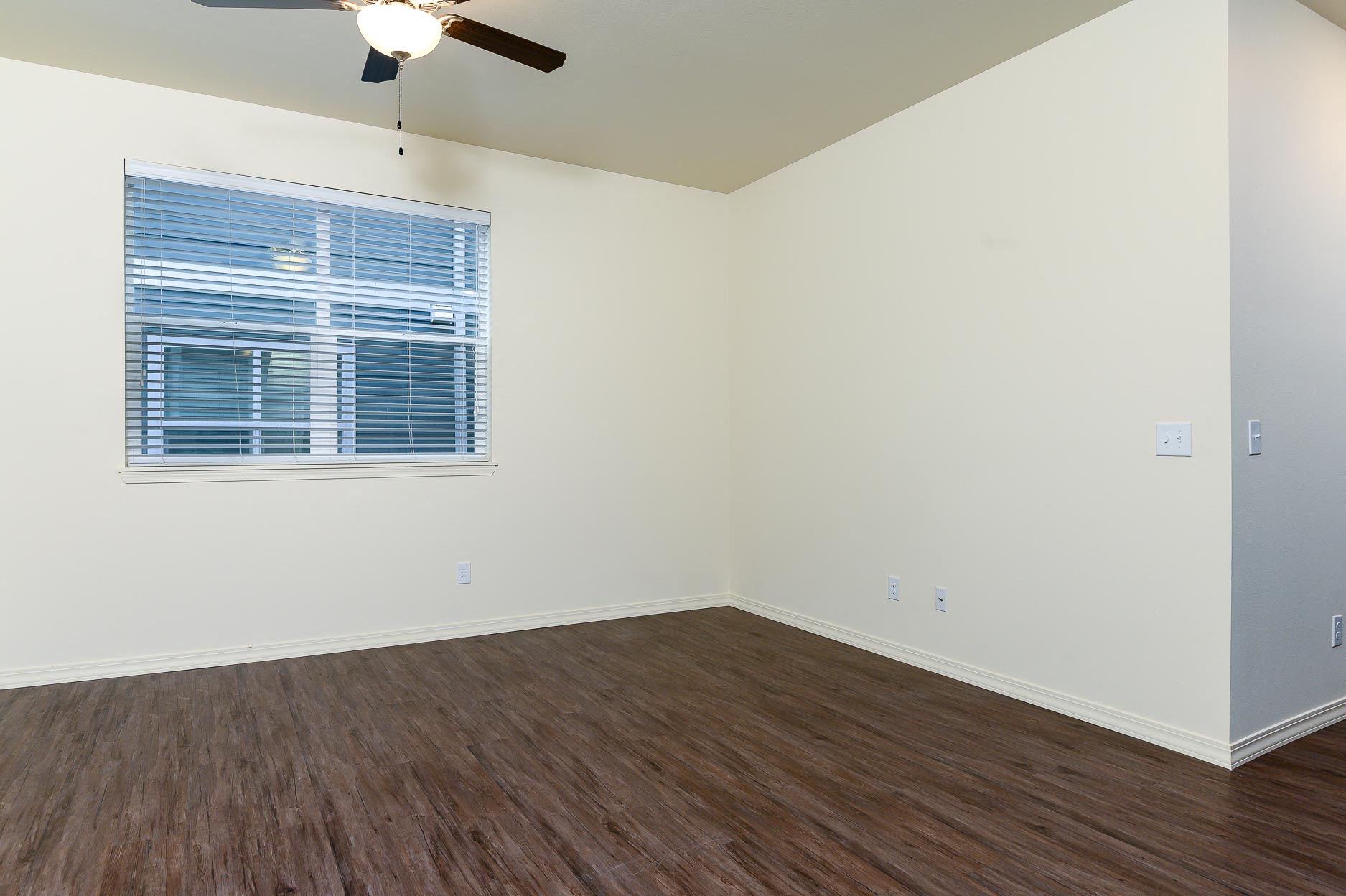 Living Room with ceiling fan.
