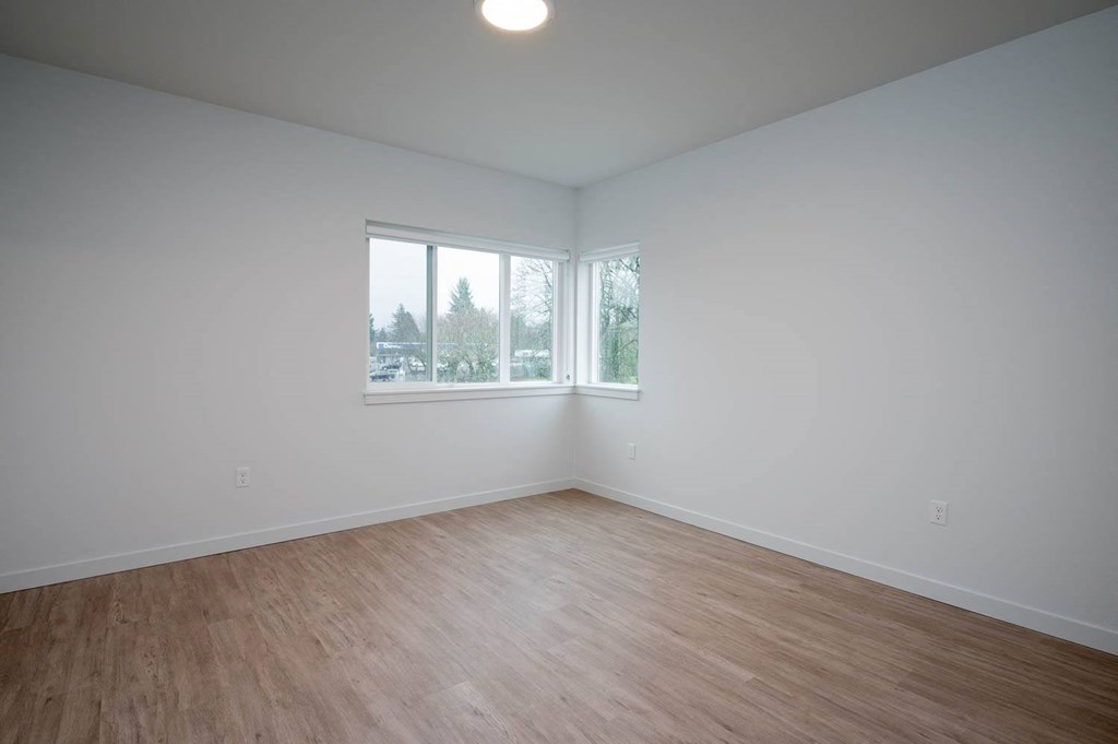 The Byway | #201 Large Primary Bedroom with Plank Flooring