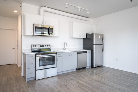 The Lenox | Kitchen Area with Stainless Steal Appliances