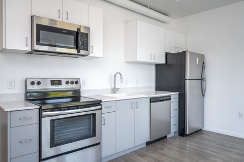 The Lenox | Kitchen Area with Stainless Steal Appliances