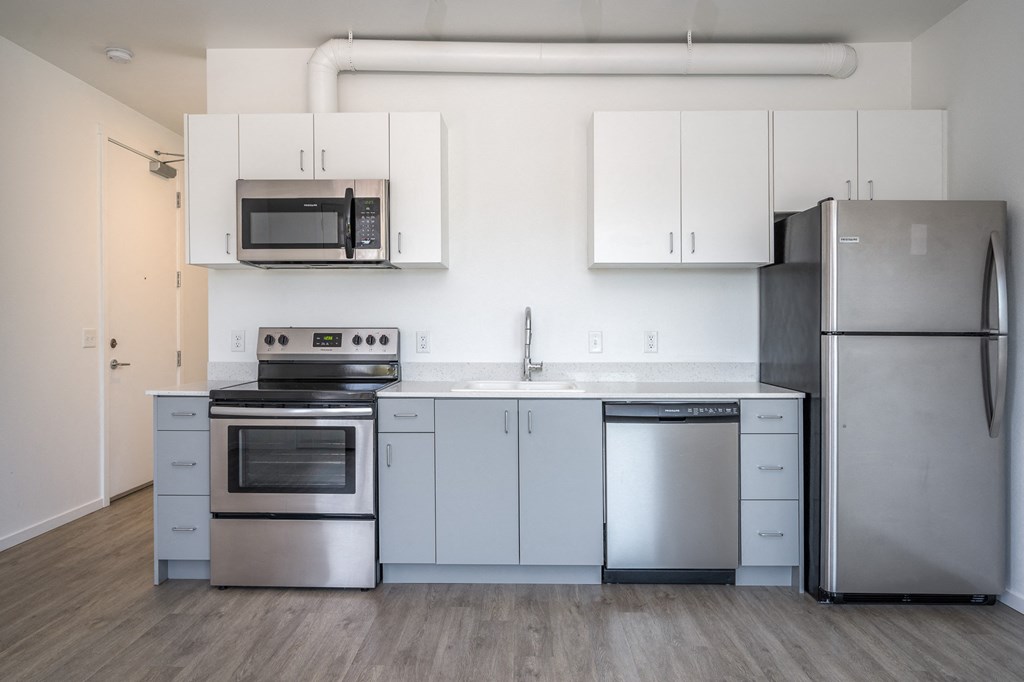 The Lenox | Kitchen Area with Stainless Steal Appliances