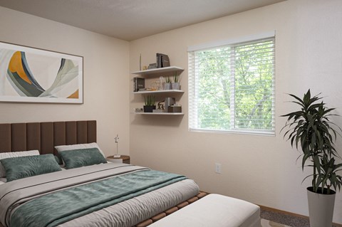 A bedroom with a large bed and a potted plant.