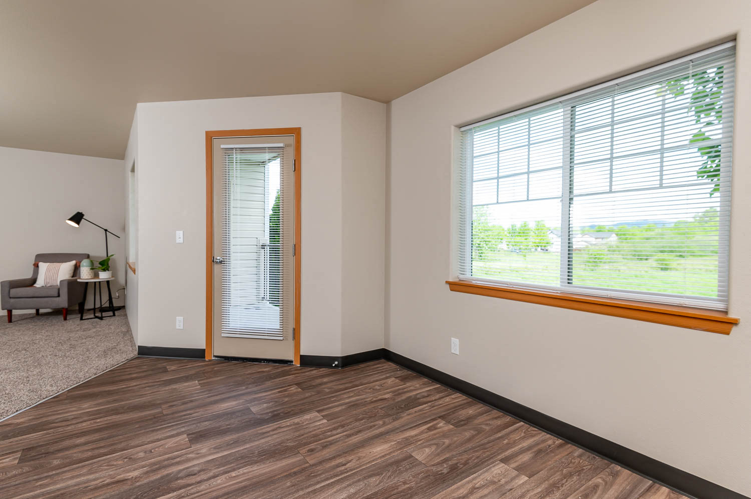 View looking out from the Dining Room into the Living Room