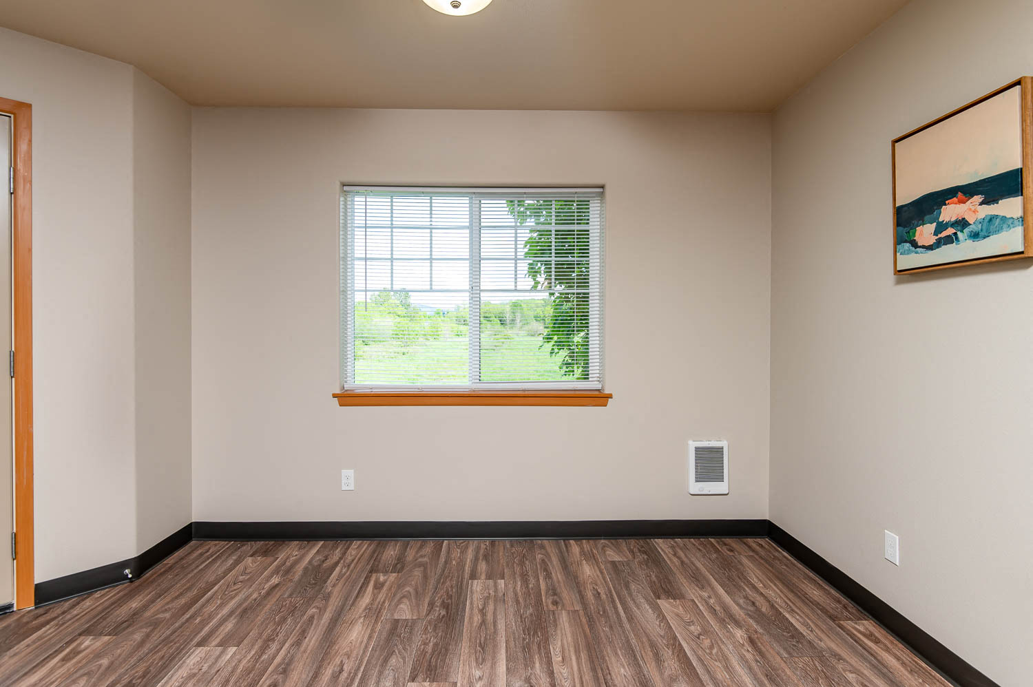 Spacious Dining Room with luxury vinyl tile flooring