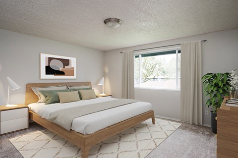 A bedroom with a large bed and a painting on the wall.