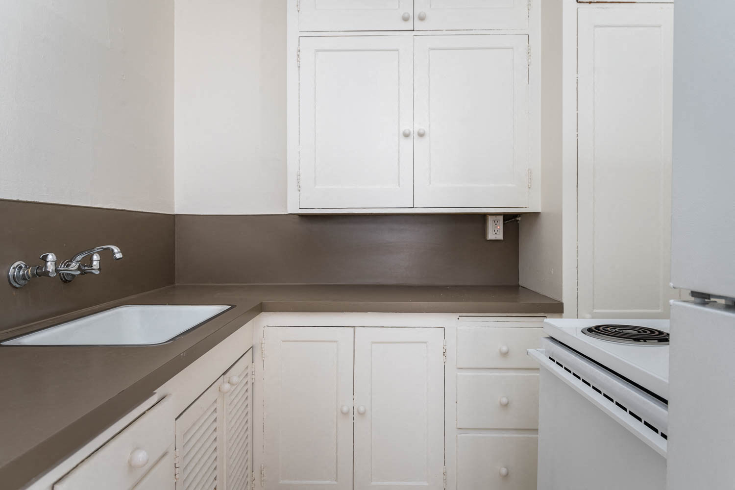 The Shannon | #307 Kitchen with White Cabinetry and Appliances