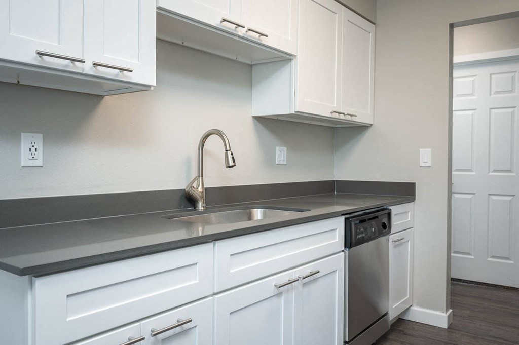 Vantage at Hillsdale | #36 Kitchen with White Cabinetry and Black & Stainless Steel Appliances