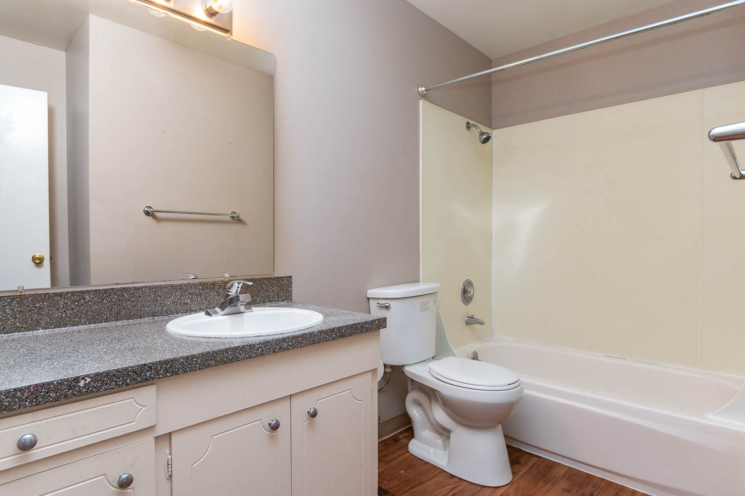 Bathroom with white cabinets