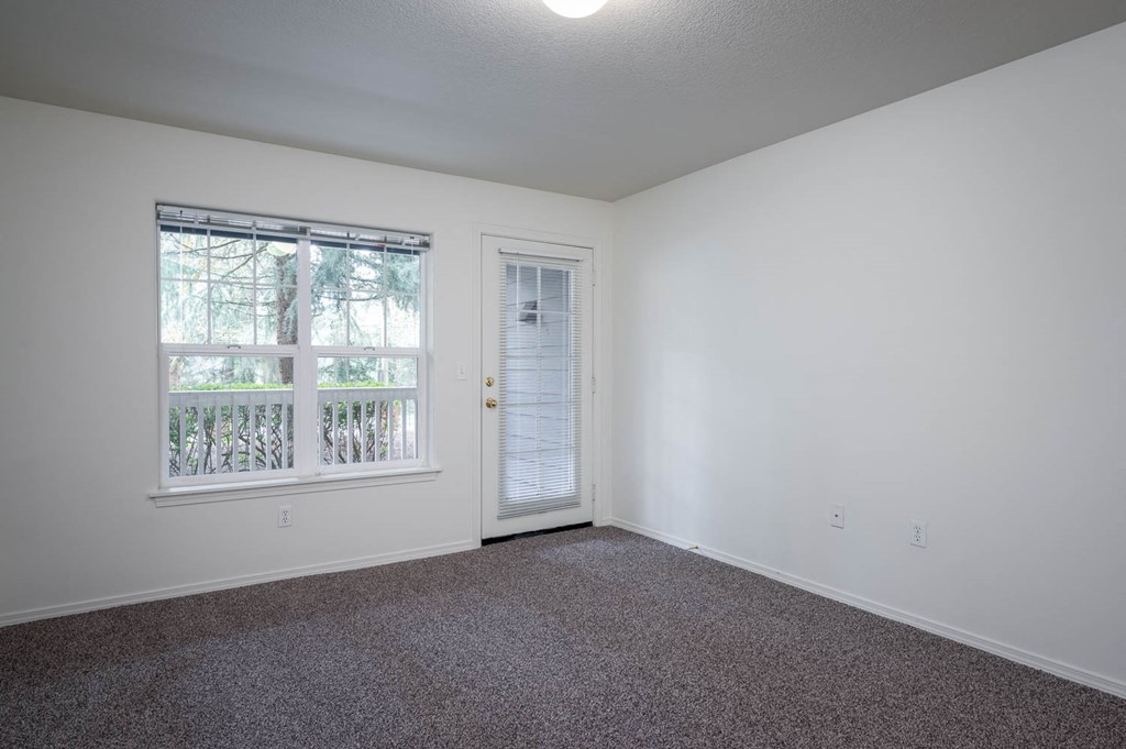 Village at Main Street | 2x2 Bedroom Two with Wall to Wall Carpeting and Light Filled Window