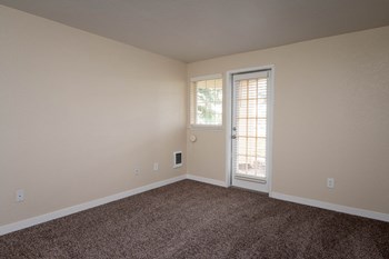 Sundial Apartments | Two Bedroom Primary Bedroom with Wall to Wall Carpet - Photo Gallery 25