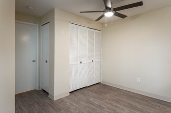 Sundial Apartments | Two Bedroom Dining Room with Plank Style Flooring - Photo Gallery 23