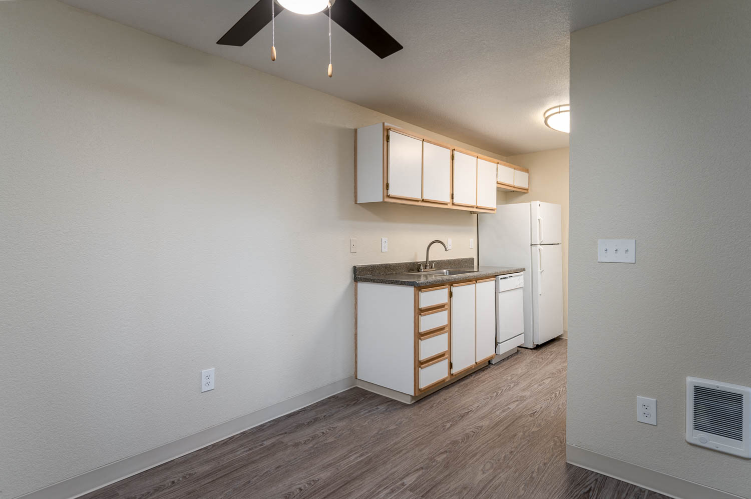 Sundial Apartments | Two Bedroom Dining Room and Kitchen