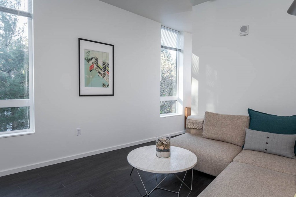 a living room with a couch and a table