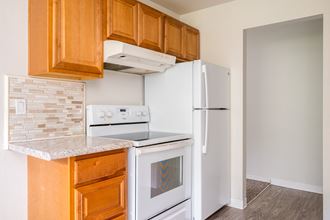 Spring Terrace| Kitchen with White Appliances