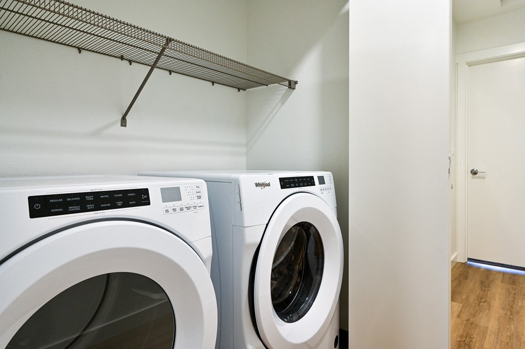 Timberview apartments with a full size front loading a washer and dryer