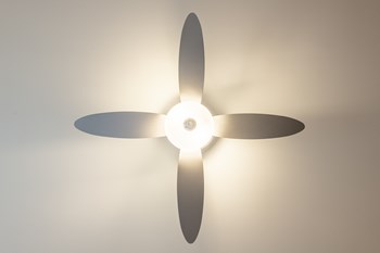 Ceiling fan with 4 blades and a light in the middle. - Photo Gallery 8