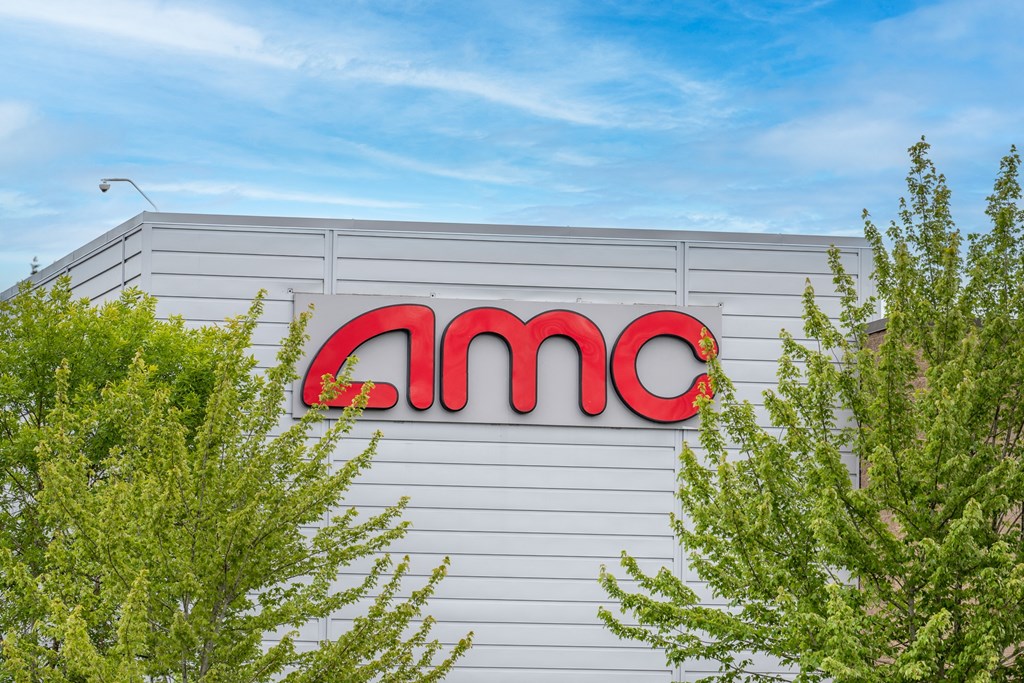 the amc logo on the side of a building