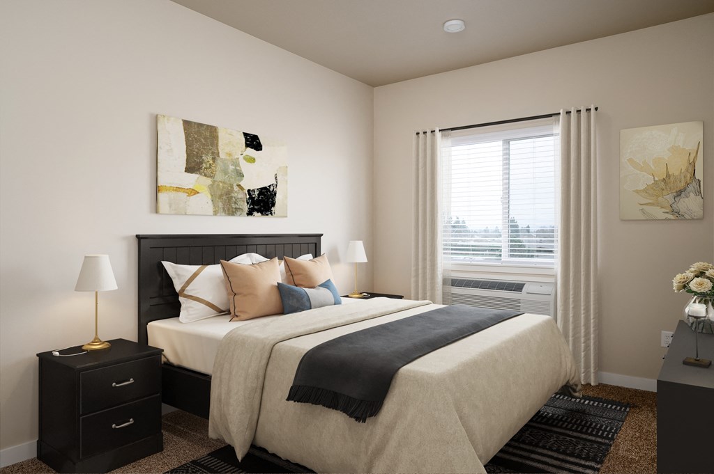 a bedroom with a bed and a window