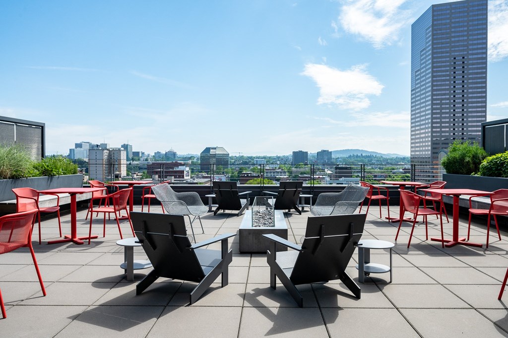 Studio Luxury Apartments in Portland OR - Couch9 Apartments - Sky Deck Outdoor Lounge with Various Lounge Seating, Dining Areas, BBQ Area, and Panoramic Views