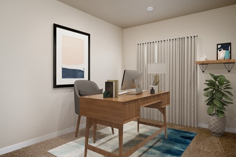 a home office with a desk and a window with a plant