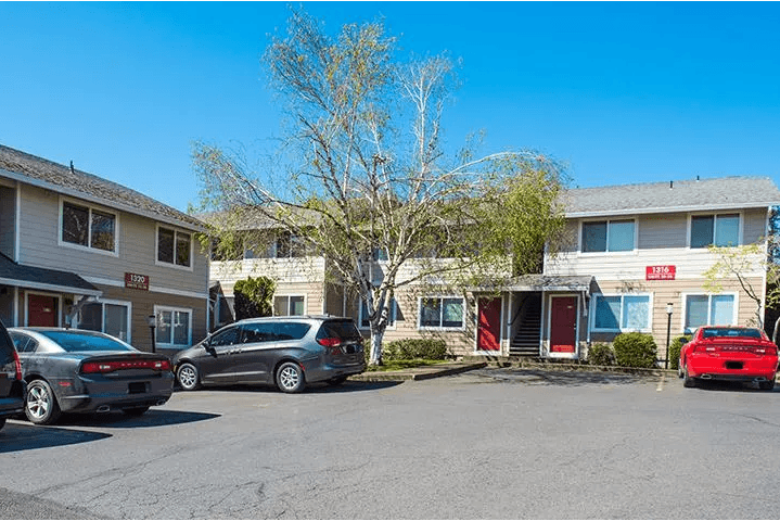 a parking lot in front of a building
