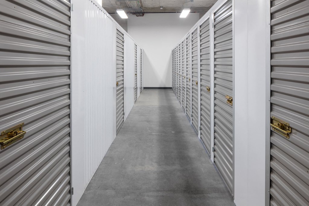 a row of stacks of filing cabinets in a white room