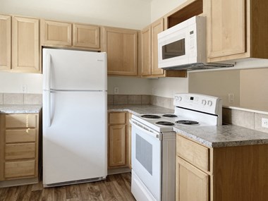 Sunnyview Townhomes| Kitchen with White Appliances