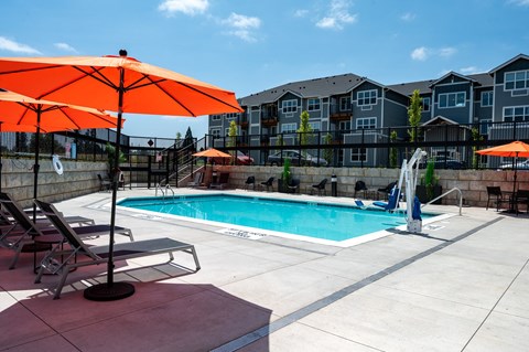 Timberview Oregon City Outdoor Seasonal Pool with Lounge Chairs and Umbrellas