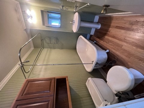 a bathroom with a toilet and a sink