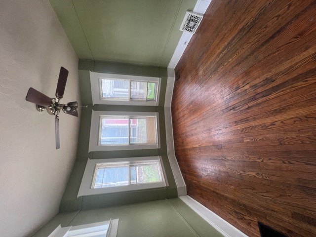 a view from the bottom of the stairs looking up to the top of the staircase and the