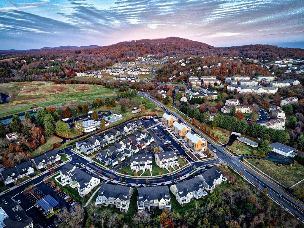 an aerial view of a parking lot in a city