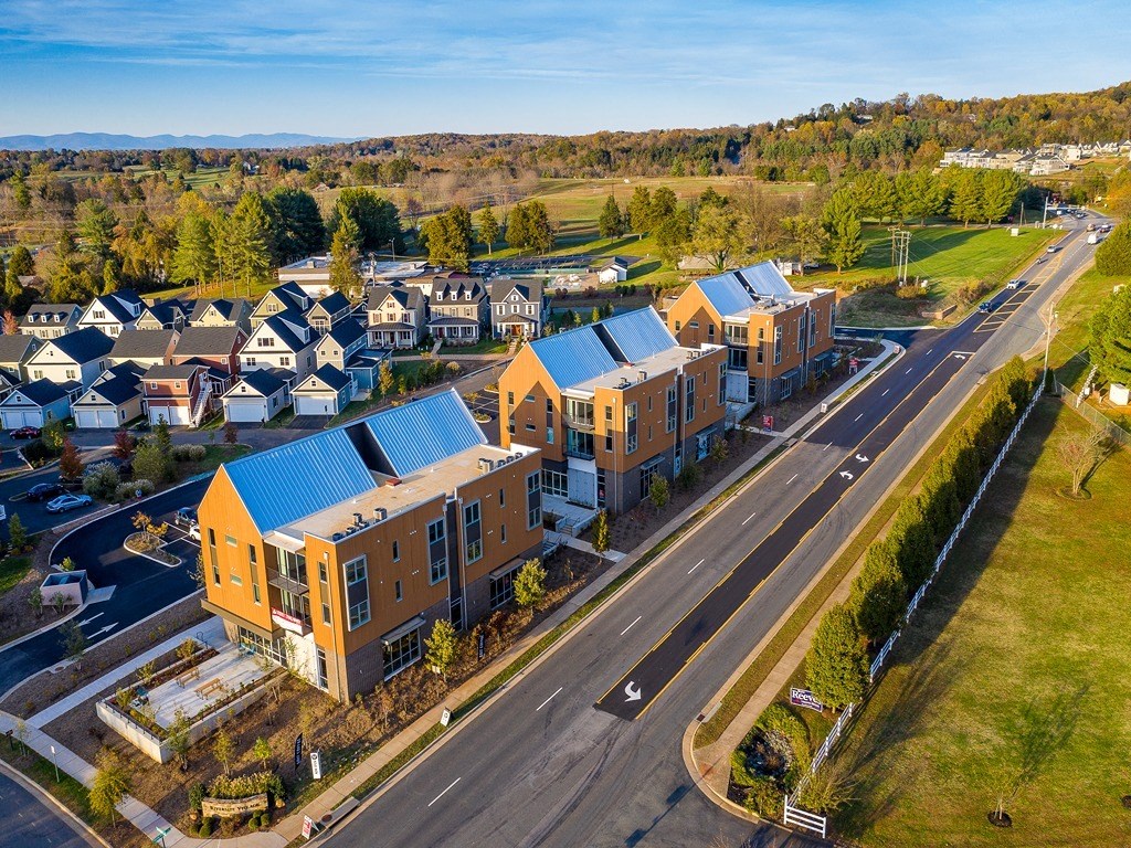 an aerial view of a campus with roads and buildings